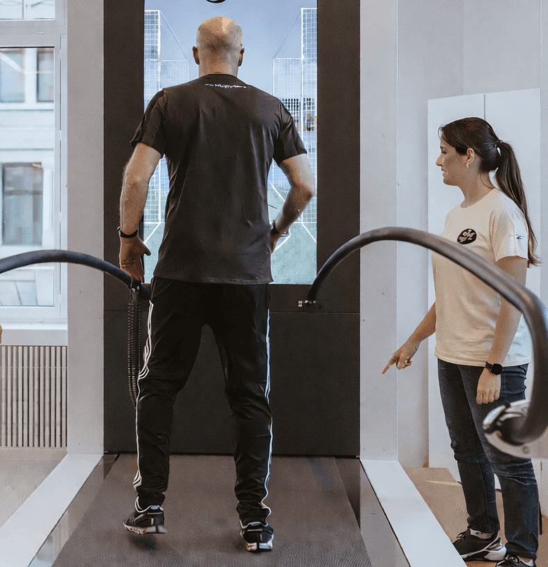 Adult patient on C-Mill gait analysis treadmill at Nextherapy